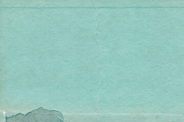 Cardboard blue abstract pattern texture close-up. Retro old paper background. Grunge concrete wall. Vintage blank wallpaper.