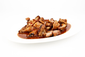 Assorted delicious Grilled pork and spicy sauce on a white plate isolated on white background
