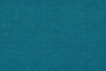 Cardboard blue abstract pattern texture close-up. Retro old paper background. Grunge concrete wall. Vintage blank wallpaper.