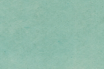 Cardboard blue abstract pattern texture close-up. Retro old paper background. Grunge concrete wall. Vintage blank wallpaper.