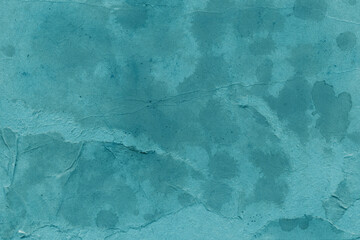 Cardboard blue abstract pattern texture close-up. Retro old paper background. Grunge concrete wall. Vintage blank wallpaper.