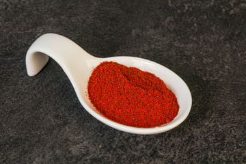 Dry paprika powder in the bowl