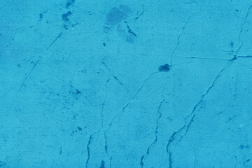 Cardboard blue abstract pattern texture close-up. Retro old paper background. Grunge concrete wall. Vintage blank wallpaper.