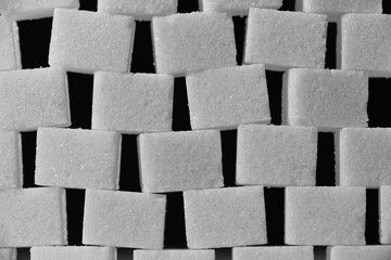 White sugar in the form of cubes.