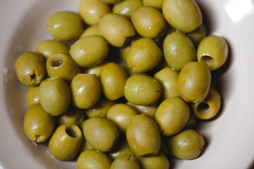 Olives on a plate.