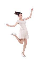 Fototapeta na wymiar Portrait of a Young woman jumping smiling