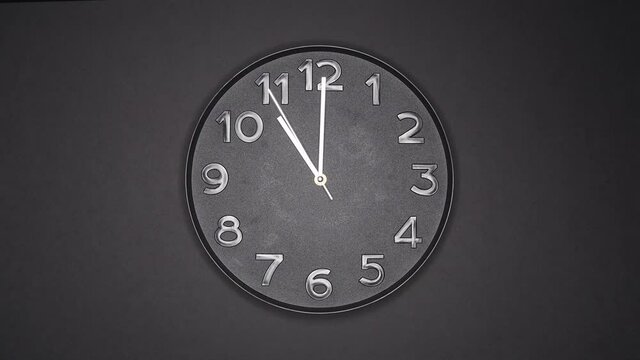 The Time Is 11.00 AM Or PM On A Black Wall Clock With A White Steel Second Hand.
