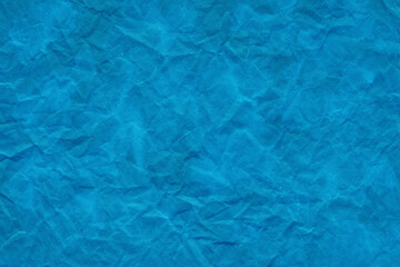 Cardboard blue abstract pattern texture close-up. Retro old paper background. Grunge concrete wall. Vintage blank wallpaper.