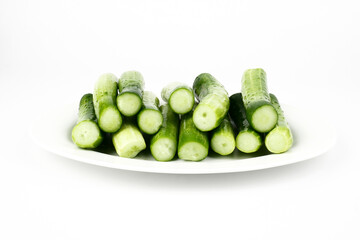 Fresh cucumber, chopped cucumber, salad ingredient,isolated on white background.
