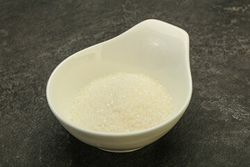 White sugar in the bowl