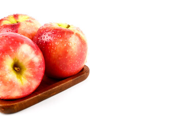 Red apples pink lady (Malus domestica Cripps Pink) isolated on white background. Organic fruits for a healthy diet and lifestyle