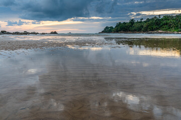 Sunset at Layan beach, lagoon in Phuket, Thailand  during  Low tide