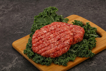 Raw beef burger cutlet for cooking