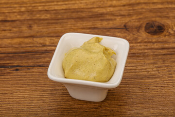 Dijon mustard sauce in the bowl