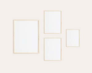 Gallery frame mockup, 4 vertical wooden frames on wall to showcase wall art.