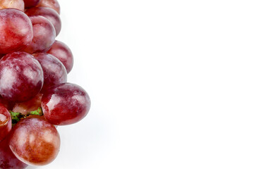 bunch of ripe and juicy red grapes isolated on white background