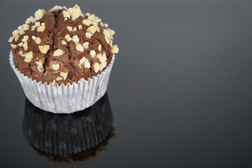 chocolate muffin on a black background	
