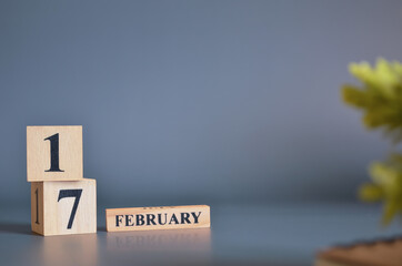 February 17, Cover in the evening time, Date Design with number cube for a background.