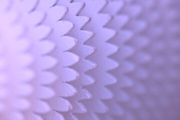 Light lilac background. Abstraction. Concentric wooden circles similar to gears.