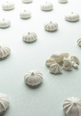 Small white meringues on the table.
