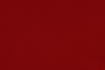Clean red retro paper background. Vintage cardboard texture. Grunge paper for drawing. Simple blank fabric pattern.