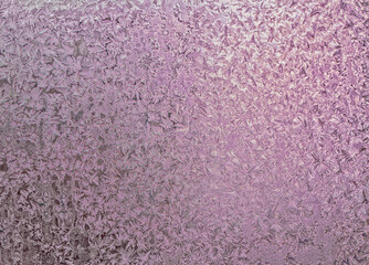 Frosty winter patterns on window glass. Close-up.