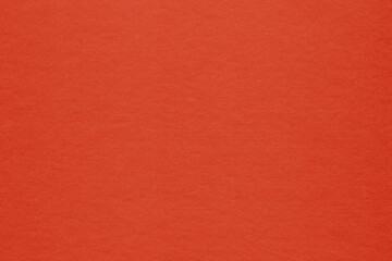 Clean red retro paper background. Vintage cardboard texture. Grunge paper for drawing. Simple blank fabric pattern.