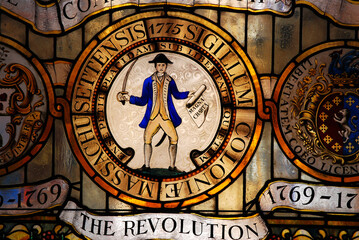 Fototapeta na wymiar A stained glass window in the Massachusetts State House in Boston honors the Revolutionary War soldiers 