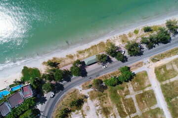 The Road villahouse city forest sea bay aerial top view  UAV