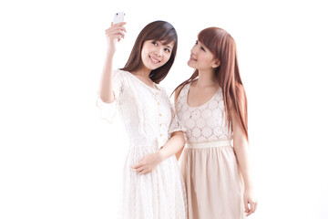Portrait of two female friends take picture of themself