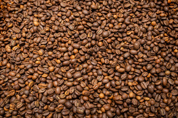 Photo background of roasted coffee beans close-up