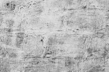 Texture of a concrete wall with cracks and scratches which can be used as a background