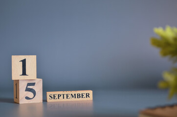 September 15, Cover in the evening time, Date Design with number cube for a background.