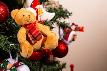 Christmas decoration with teddy bear highlighted. Selective focus.