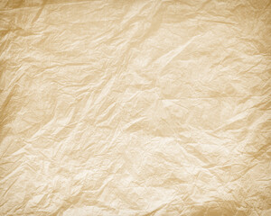 Worn, old, crumpled paper. Old Sepia photo. The background for the texture looks like crumpled parchment in yellow and brown