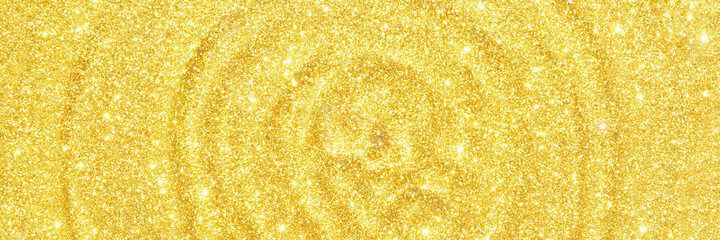 Water circle with gold sparkles background. Yellow glitter backdrop. Golden texture. New year...