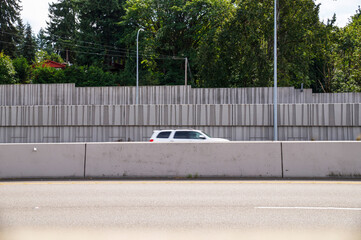 Concrete acoustic barriers decorated with a structural pattern. Protection of residents against...