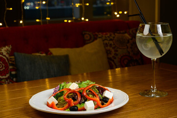Salad with lettuce, pepper and parmesan cheese