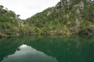 Naklejka na ściany i meble view the lake of the source of the river Borosa located in the Natural Park of the Sierras de Cazorla, Segura and las Villas, Andalucia, Spain.