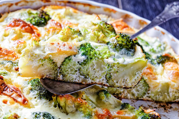 broccoli florets baked with brie cheese, top view