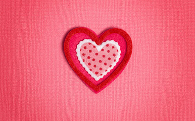 Simple Background with Felt Love Hearts on Pink Background