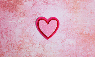 Simple Background with Felt Love Hearts on Pink Background