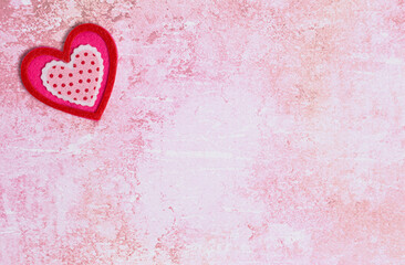 Simple Background with Felt Love Hearts on Pink Background
