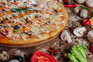 fresh pizza on the boards