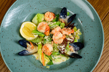 salad with oysters, shrimps and vegetables
