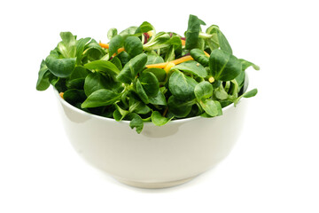 Corn salad in bowl isolated on white background