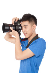 Portrait of a young Photographer holding camera