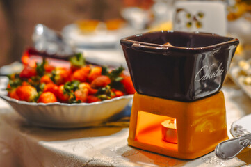 Chocolate fondue with fresh strawberries