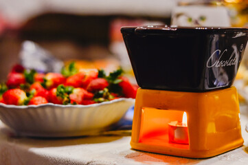 Chocolate fondue with fresh strawberries