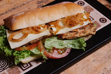 
Colombian fast food. mixed meat sandwich, with fresh vegetables